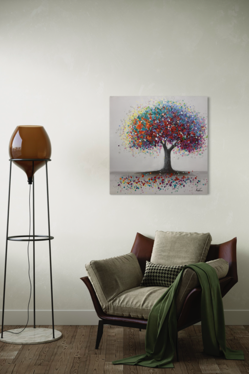 Een schilderij met een kleurrijke boom